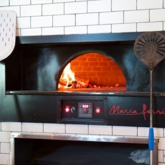 Enclosed oven in fortina restaurant in New York