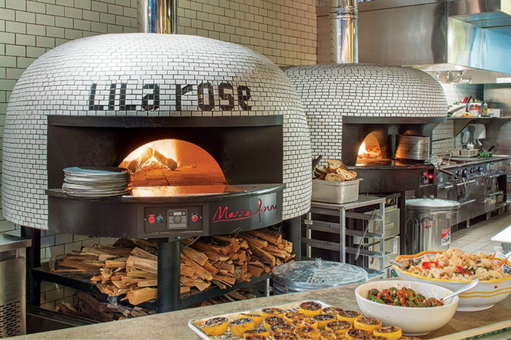 Wood fired Neapolitan pizza oven in a restaurant image