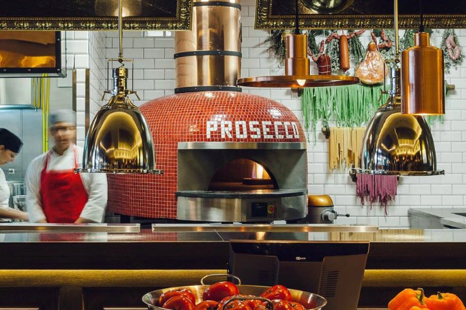 marra forni client prosecco using our commercial pizza oven in the restaurant image