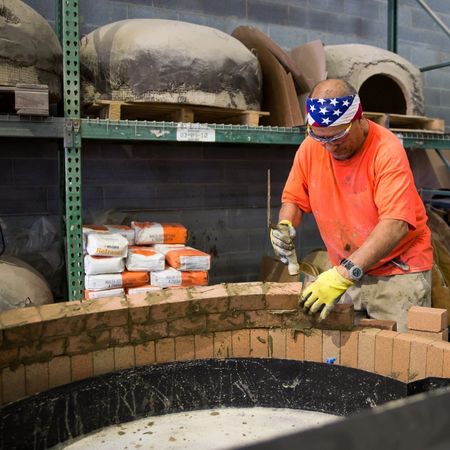Building rotating pizza oven brick by brick
