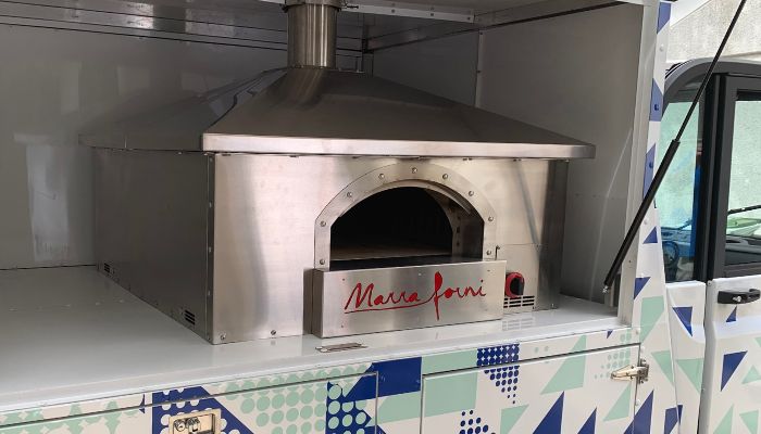 ms brick oven on a food trailer image